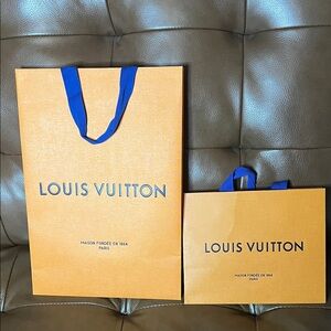 Two Louis Vuitton LV Shopping Bags
